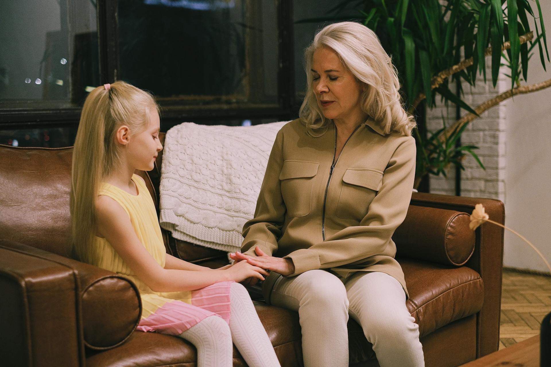 An SLP independent contractor works with a child in her office.